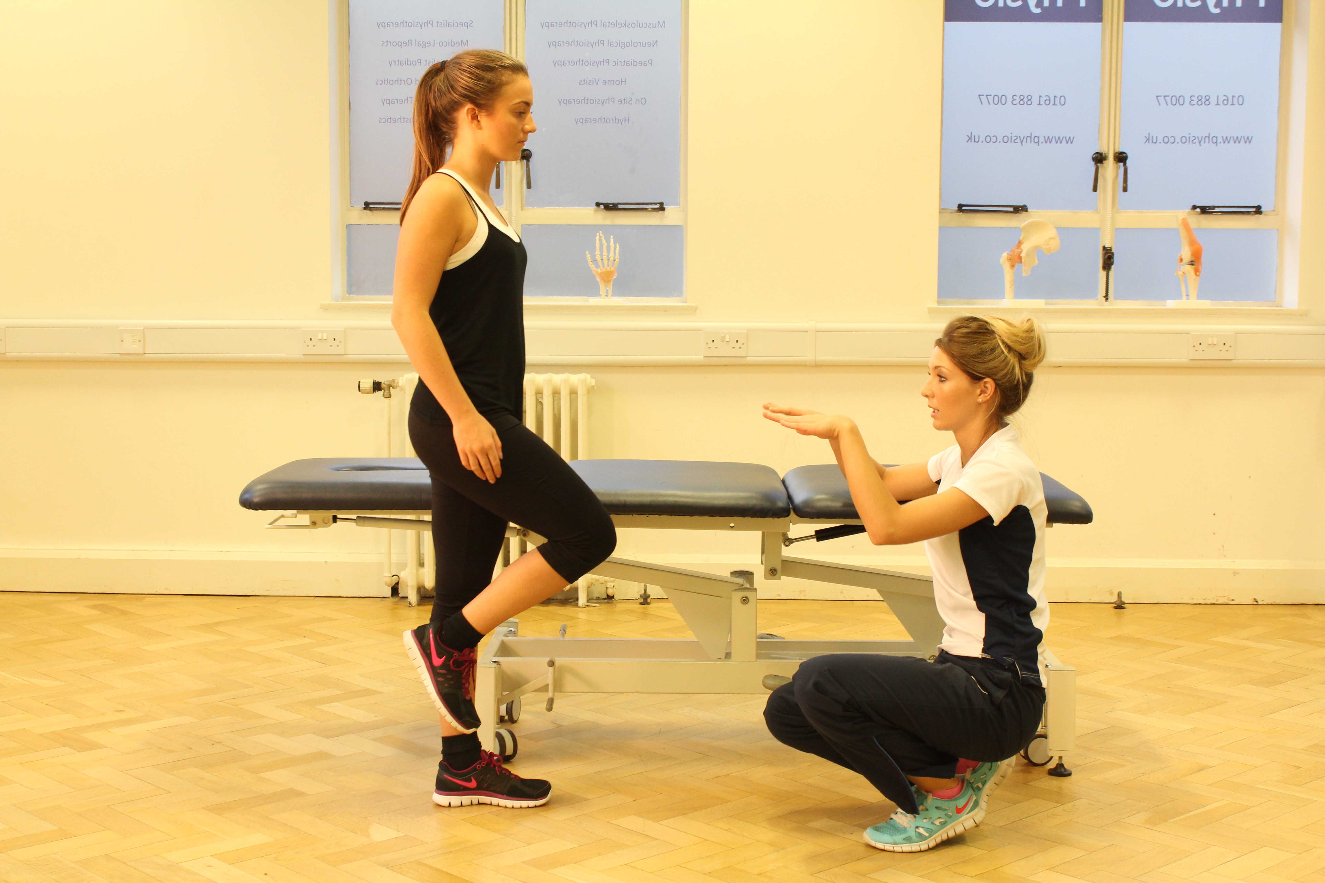 Our therapist providing treatment to help balance following foot and ankle sprains.