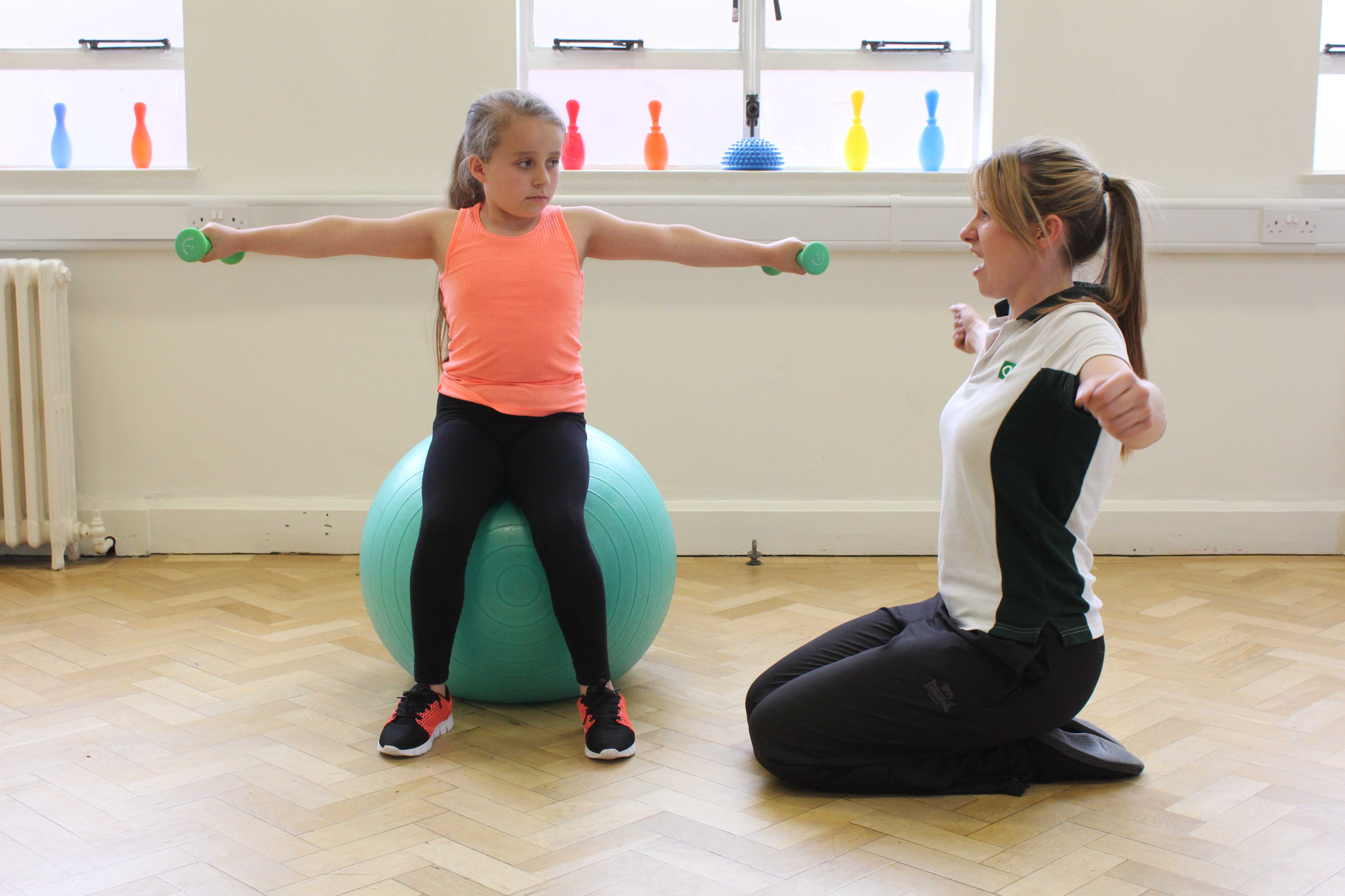 Our physiotherapist encouraging gentle strengthening exercises to help her patient